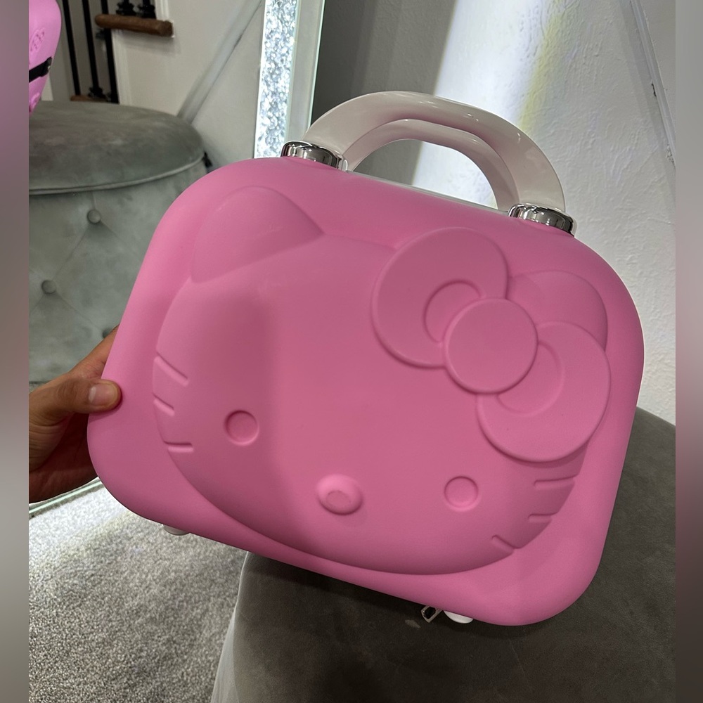 Hello kitty carry on bag / makeup bag